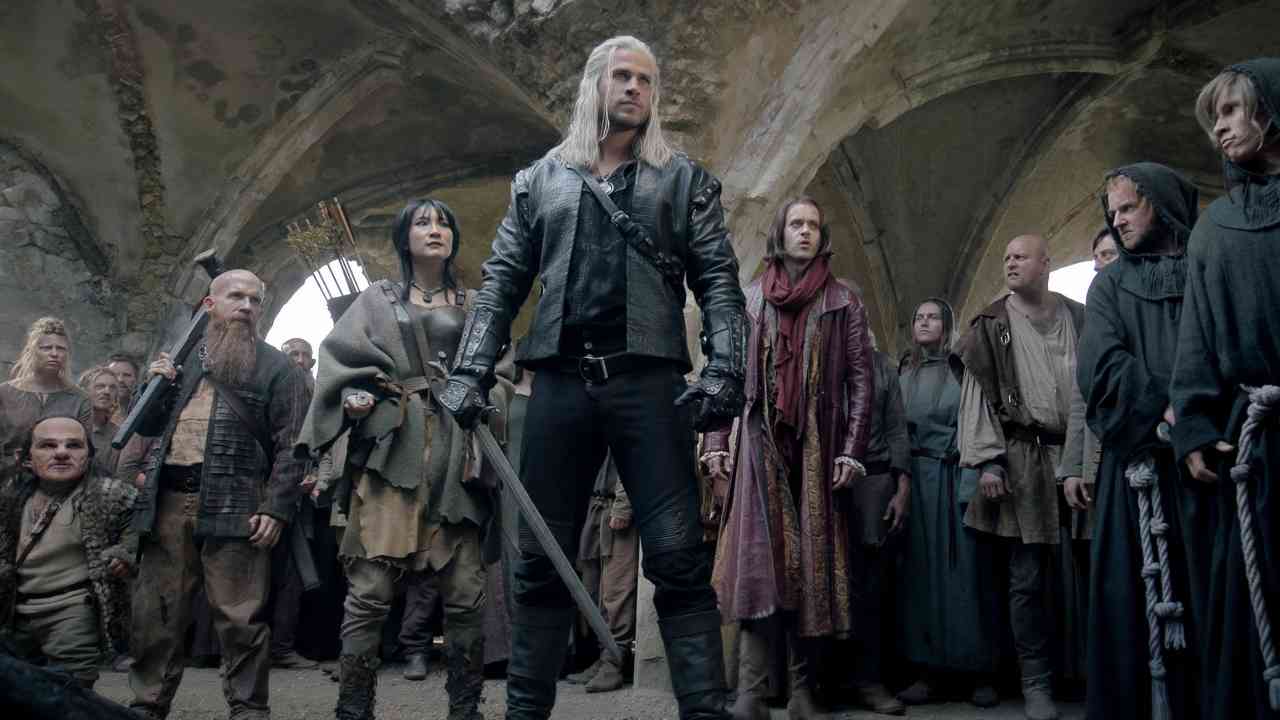 Geralt de Riv devant un groupe de personnes